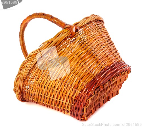 Image of Empty wicker basket on white background
