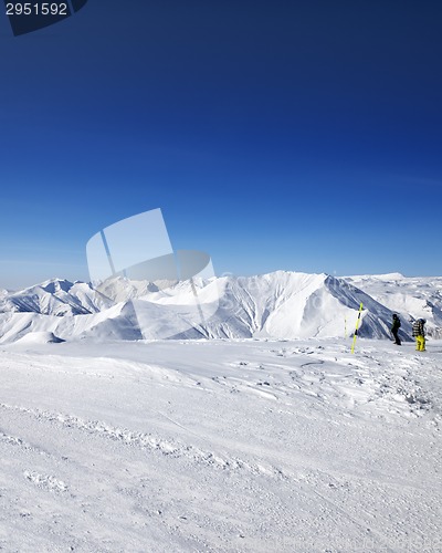 Image of Snowboarders on ski slope