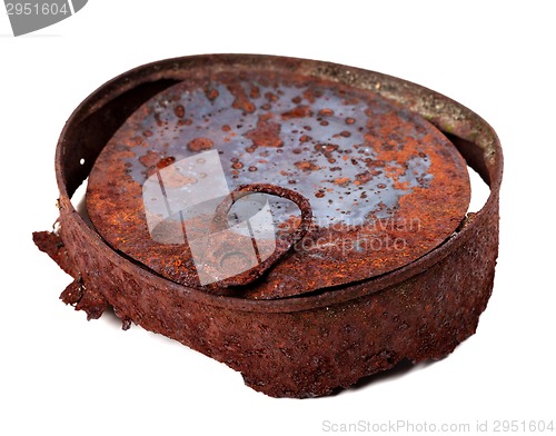 Image of Old rusty tin can