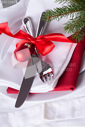 Image of Romantic red Christmas table setting