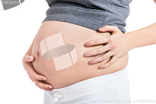 Image of Happy beautiful young pregnant woman