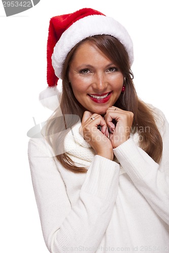 Image of Attractive woman wearing a festive red Santa hat