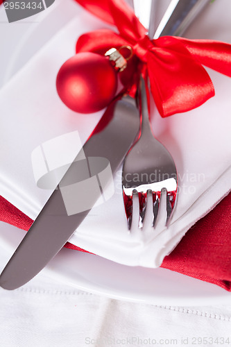 Image of Romantic red Christmas table setting