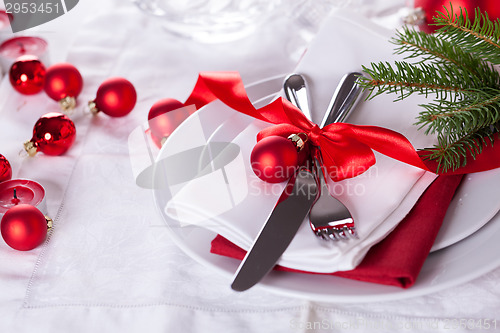 Image of Romantic red Christmas table setting