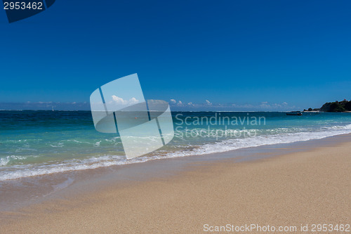 Image of Beautiful tropical beach with lush vegetation