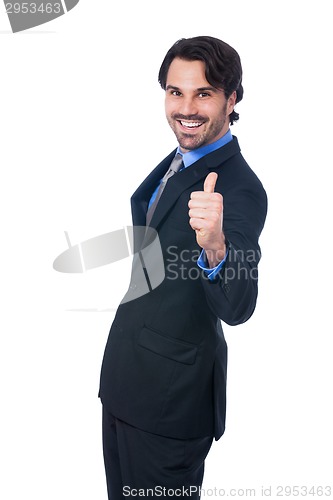 Image of Enthusiastic businessman giving a thumbs up