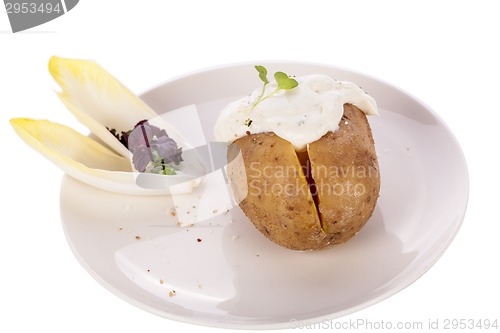 Image of Baked jacket potato with sour cream sauce