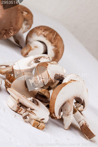 Image of Diced and whole agaricus brown button mushrooms