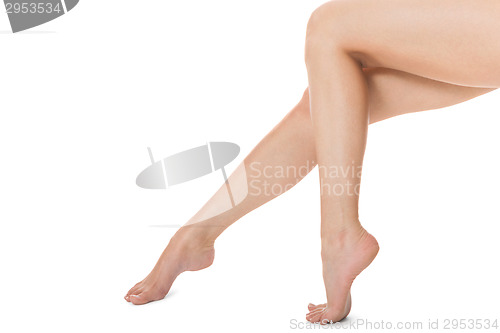 Image of Elegant long bare female legs