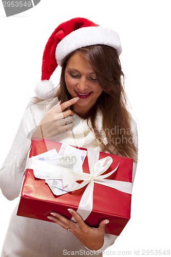 Image of Young woman with an Xmas gift and money