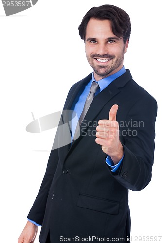 Image of Enthusiastic businessman giving a thumbs up