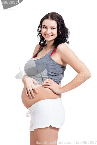 Image of Happy beautiful young pregnant woman