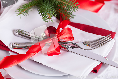 Image of Romantic red Christmas table setting