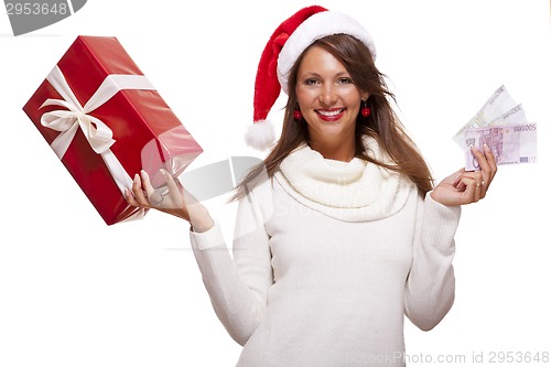 Image of Young woman with an Xmas gift and money