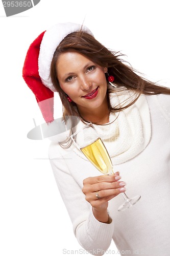 Image of Playful woman celebrating Xmas blowing a kiss