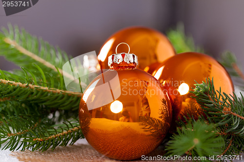 Image of Shiny bright copper colored Christmas balls