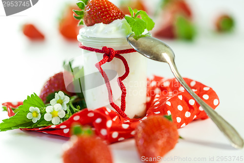 Image of Fresh strawberries with healthy yogurt