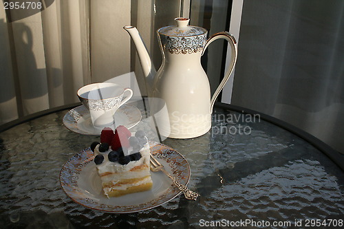 Image of Piece of gateau with  raspberry and blueberry