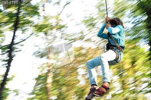 Image of child in a climbing adventure activity park