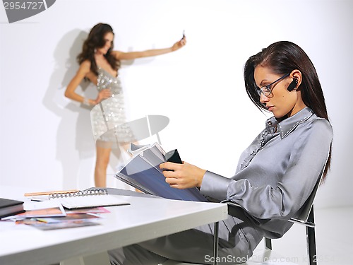 Image of woman is working at the office ll