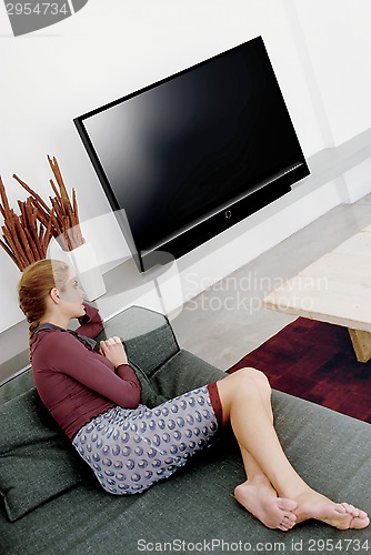 Image of woman watching television a