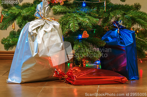 Image of Christmas presents under the tree