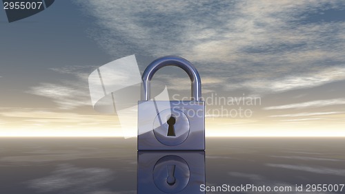 Image of padlock under blue sky