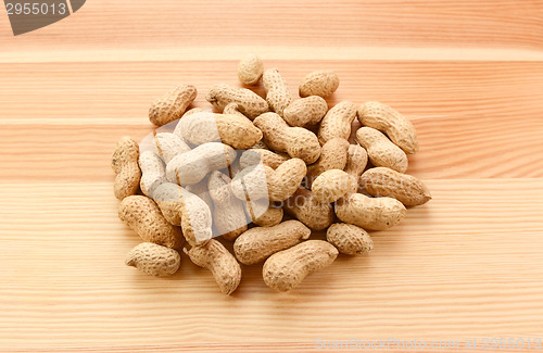 Image of Heap of monkey nuts, peanuts or groundnuts in shells