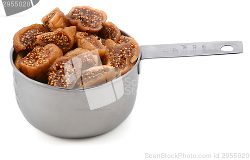 Image of Chopped figs in a cup measure