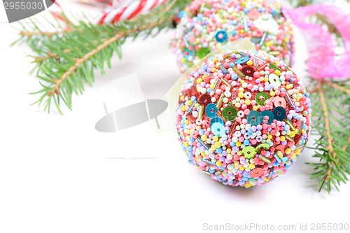 Image of Christmas balls with green spruce