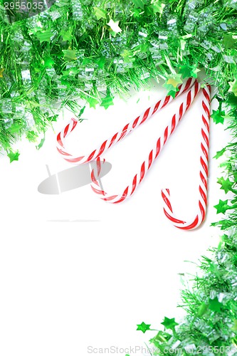 Image of Green tinsel with candy canes decoration