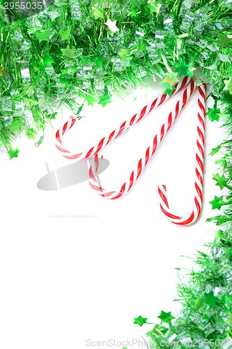 Image of Green tinsel with candy canes decoration