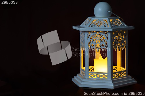 Image of Old lantern on dark background