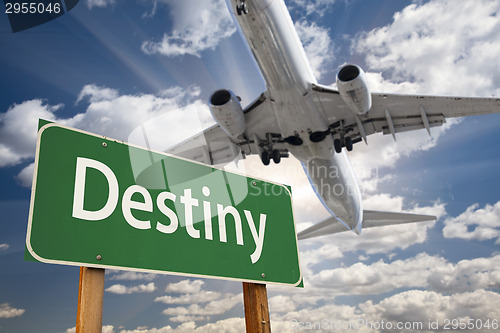 Image of Destiny Green Road Sign and Airplane Above