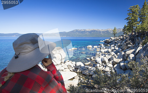 Image of Woman Looking Over Beautiful Shoreline of Lake Tahoe.