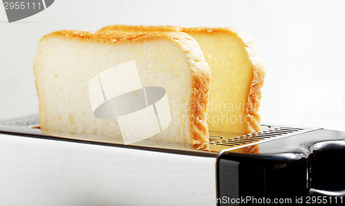 Image of Toaster with bread slices 