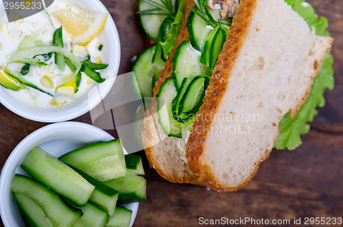 Image of fresh vegetarian sandwich with garlic cheese dip salad