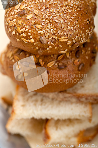 Image of organic bread over rustic table