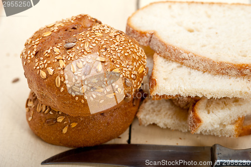 Image of organic bread over rustic table