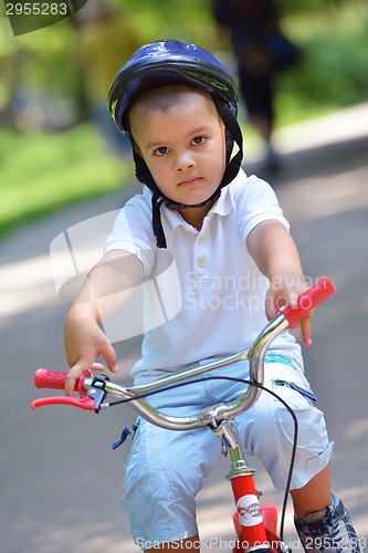 Image of happy grandfather and child in park