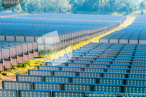 Image of solar panels field on a sunny day