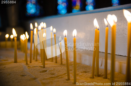 Image of candles in the Catholic Church, shallow depth of field