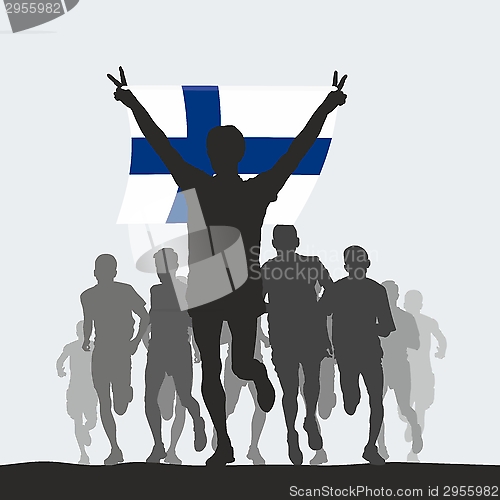 Image of Winner with the  Finland flag at the finish