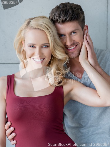 Image of Loving happy couple posing for the camera