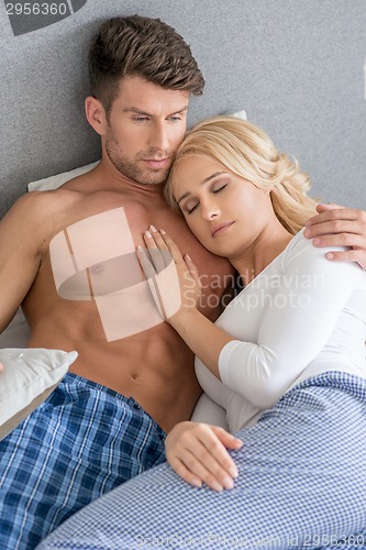 Image of Romantic Lovers on Bed Fashion Shoot