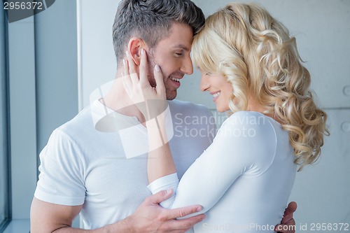 Image of Loving couple enjoy a tender moment