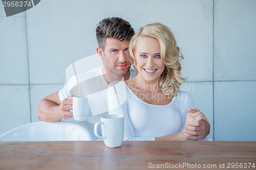 Image of Middle Age Lovers in Coffee Time Looking at Camera