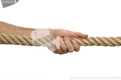 Image of Man pulls a rope