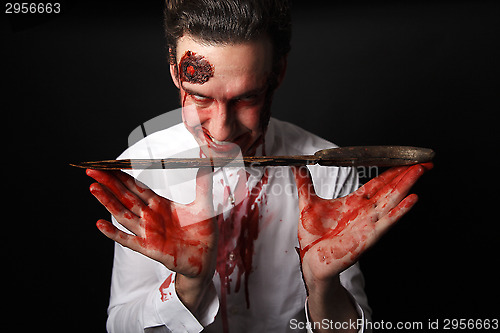 Image of Psychopath with bloody knive