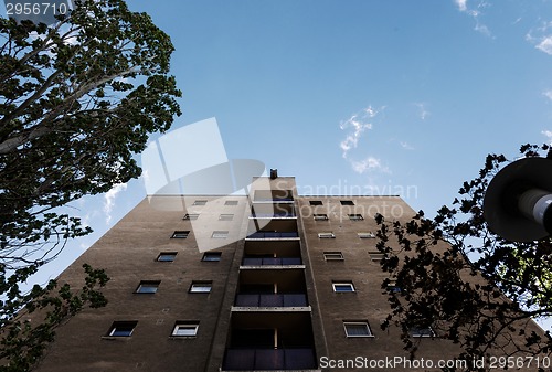 Image of Dark abandoned building with sky